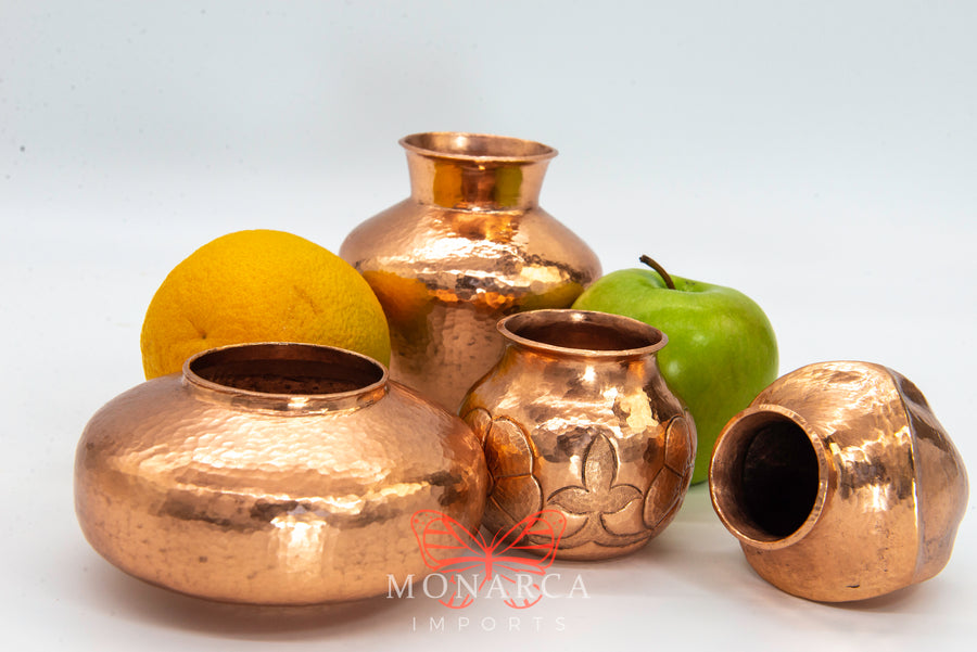 set of mini copper vases made out of copper